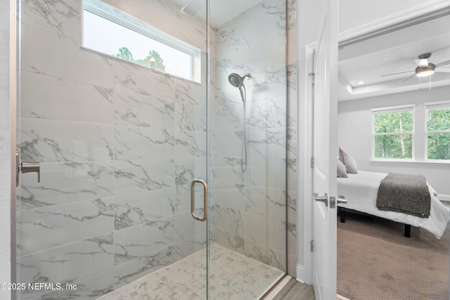 52 Key Grass Ct, Saint Johns, FL 32259 - ensuite bathroom featuring a marble finish shower, healthy amount of natural light, and a ceiling fan
