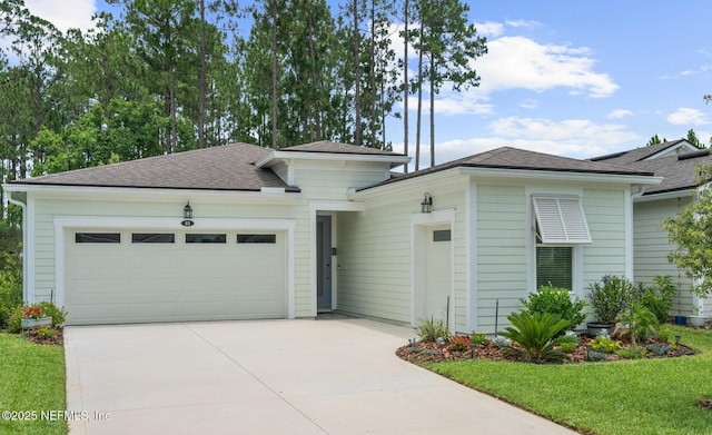 52 Key Grass Ct, Saint Johns, FL 32259 - view of front of home featuring a garage, concrete driveway, and a shingled roof