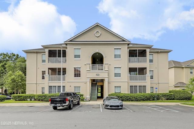 8601 Beach Blvd Unit 1008, Jacksonville, FL 32216 - view of property with uncovered parking