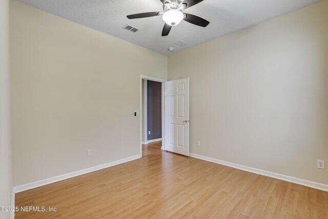 8601 Beach Blvd Unit 1008, Jacksonville, FL 32216 - unfurnished room with light wood-type flooring and ceiling fan