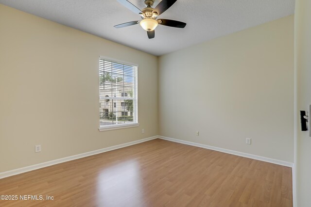 8601 Beach Blvd Unit 1008, Jacksonville, FL 32216 - spare room with light wood-type flooring and a ceiling fan