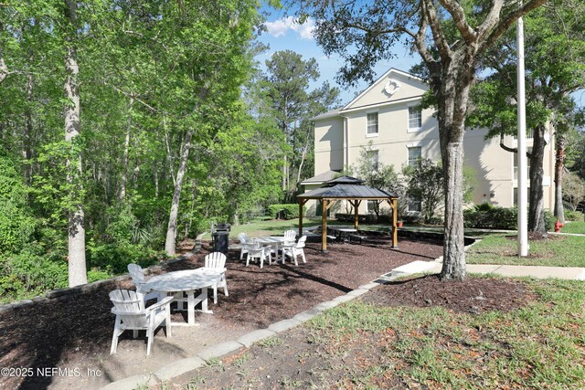 8601 Beach Blvd Unit 1008, Jacksonville, FL 32216 - view of yard with a gazebo