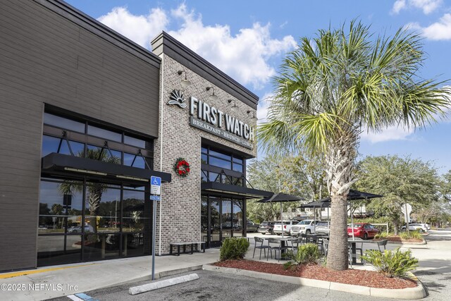 8601 Beach Blvd Unit 1008, Jacksonville, FL 32216 - view of property with uncovered parking