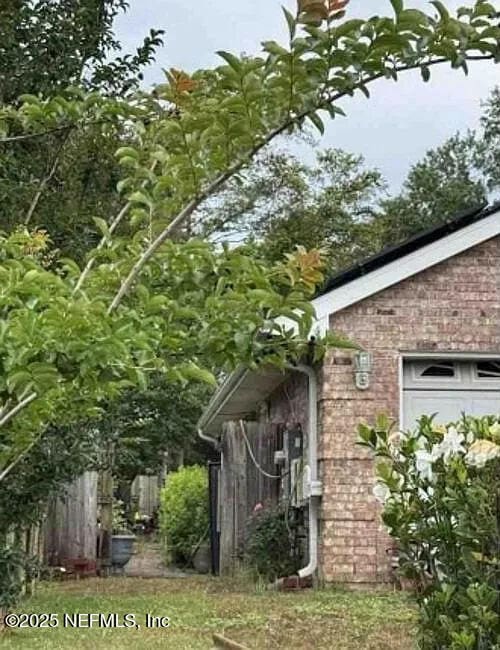 2811 Dunsmuir Dr, Navarre, FL 32566 - view of property exterior with brick siding