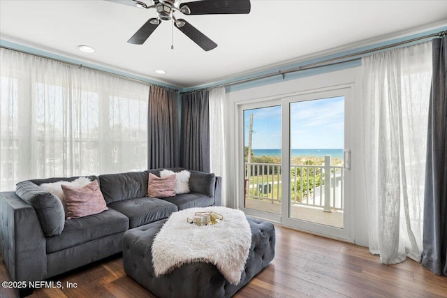 1506 Strand St, Neptune Beach, FL 32266 - living area featuring a water view, wood finished floors, and a ceiling fan