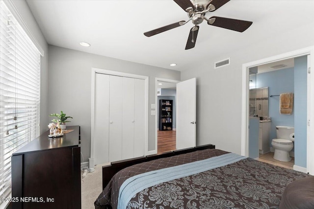 1506 Strand St, Neptune Beach, FL 32266 - carpeted bedroom featuring a closet, a ceiling fan, and ensuite bathroom
