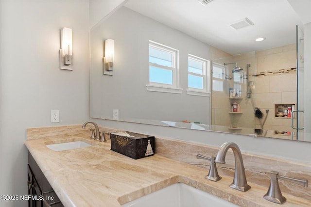 1506 Strand St, Neptune Beach, FL 32266 - full bathroom with double vanity, a tile shower, and recessed lighting