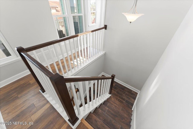 1506 Strand St, Neptune Beach, FL 32266 - staircase featuring wood finished floors and baseboards