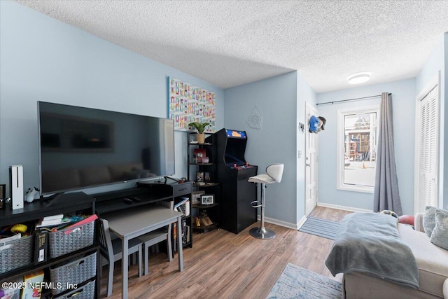 1506 Strand St, Neptune Beach, FL 32266 - office with wood finished floors and a textured ceiling