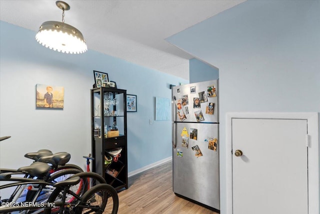 1506 Strand St, Neptune Beach, FL 32266 - interior space with freestanding refrigerator and light wood-style floors
