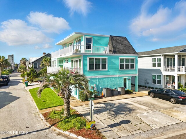 1506 Strand St, Neptune Beach, FL 32266 - view of front of property with roof with shingles