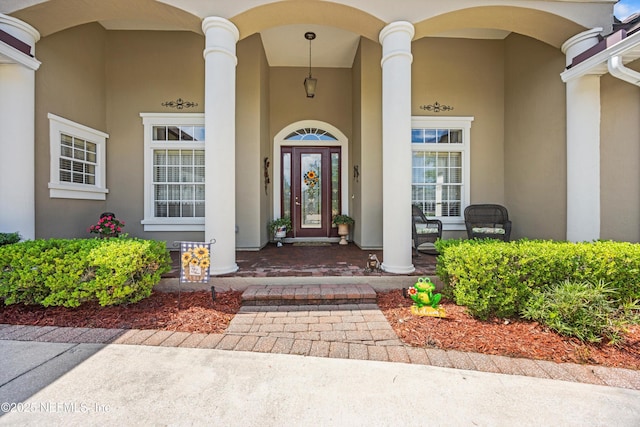 641 Donald Ross Way, Saint Augustine, FL 32092 - property entrance with covered porch and stucco siding