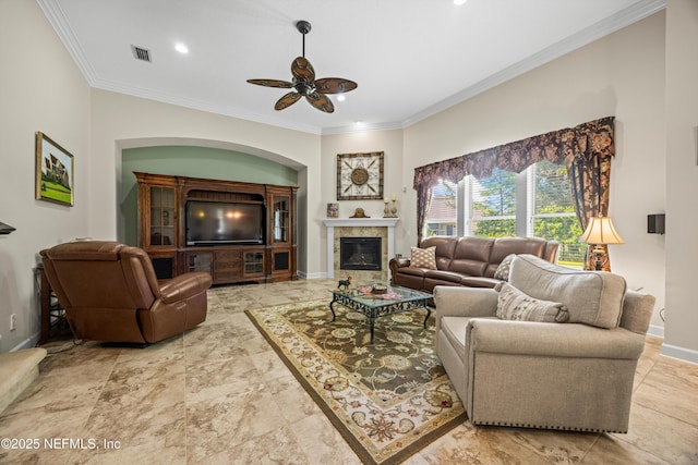 641 Donald Ross Way, Saint Augustine, FL 32092 - living room with a ceiling fan, ornamental molding, a glass covered fireplace, and recessed lighting