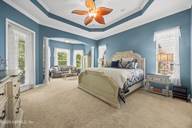 641 Donald Ross Way, Saint Augustine, FL 32092 - bedroom with carpet floors, ornamental molding, decorative columns, a tray ceiling, and access to outside