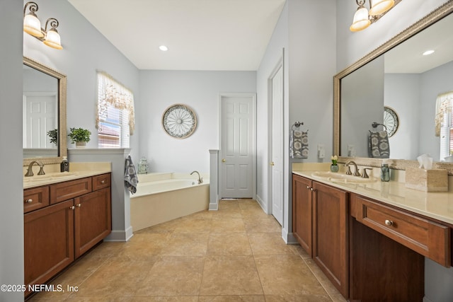 641 Donald Ross Way, Saint Augustine, FL 32092 - bathroom featuring plenty of natural light, a bath, two vanities, and recessed lighting