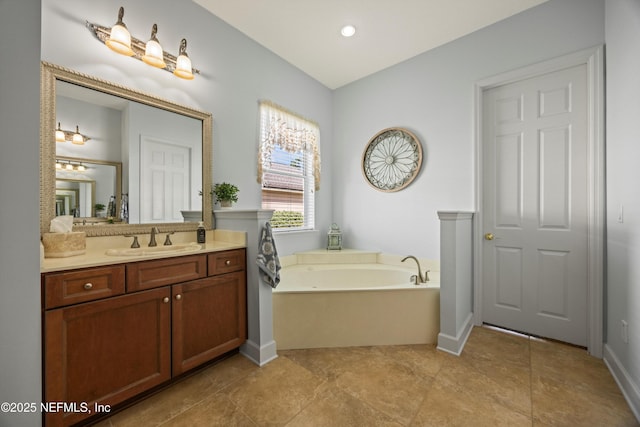 641 Donald Ross Way, Saint Augustine, FL 32092 - full bathroom with vanity, a garden tub, and recessed lighting