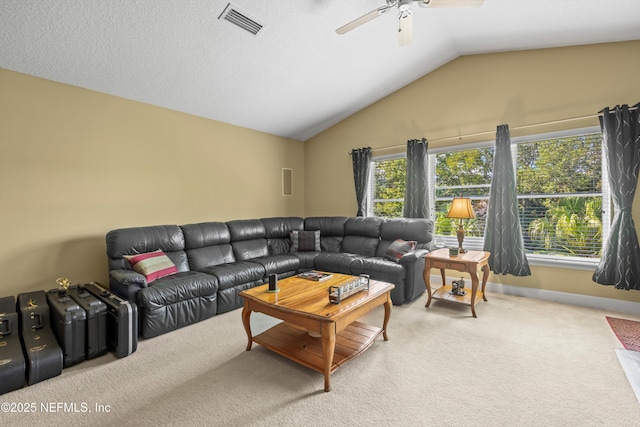641 Donald Ross Way, Saint Augustine, FL 32092 - living room featuring carpet flooring, ceiling fan, plenty of natural light, and vaulted ceiling
