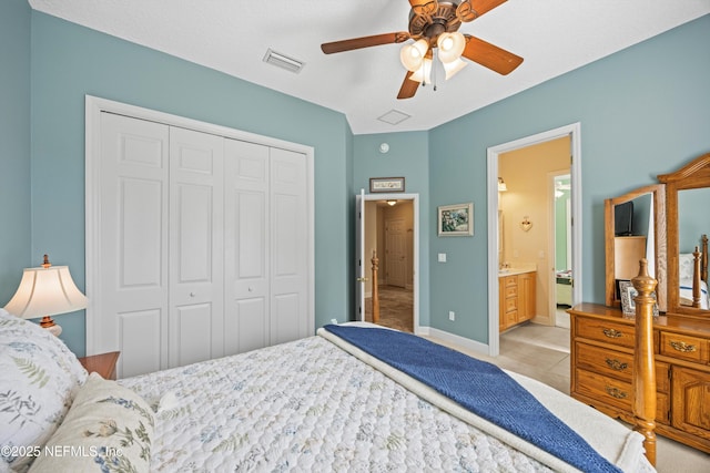 641 Donald Ross Way, Saint Augustine, FL 32092 - bedroom featuring a closet, ceiling fan, light tile patterned floors, and connected bathroom