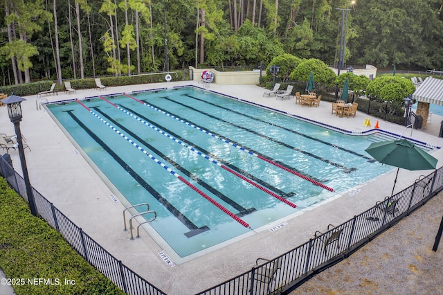 641 Donald Ross Way, Saint Augustine, FL 32092 - community pool featuring a forest view and a patio