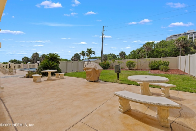 3060 N Atlantic Ave Unit 708, Cocoa Beach, FL 32931 - view of patio with a grill