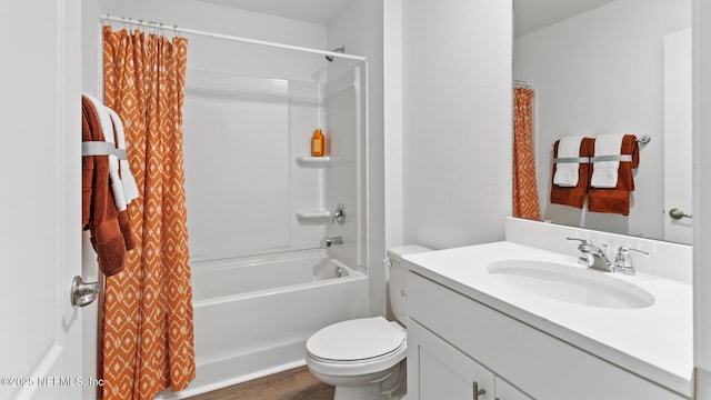 71 Green Cir, Palm Coast, FL 32164 - bathroom featuring vanity, toilet, shower / bath combo, and wood finished floors