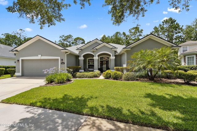 14220 Palmetto Springs St, Jacksonville, FL 32258 - ranch-style house featuring stucco siding, an attached garage, a front yard, and concrete driveway