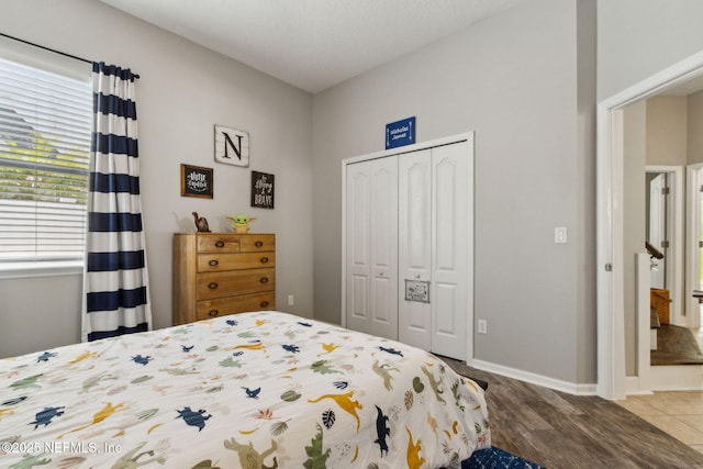 14220 Palmetto Springs St, Jacksonville, FL 32258 - bedroom featuring a closet and wood finished floors