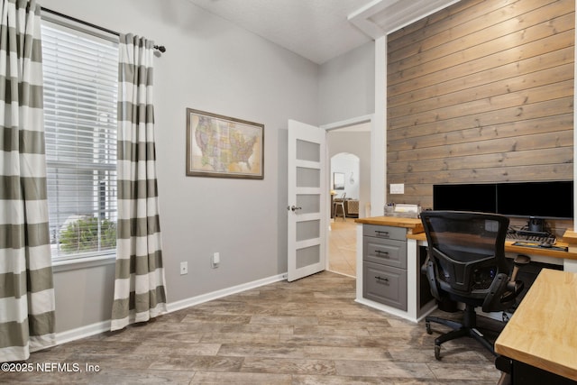 14220 Palmetto Springs St, Jacksonville, FL 32258 - home office featuring light wood finished floors and arched walkways