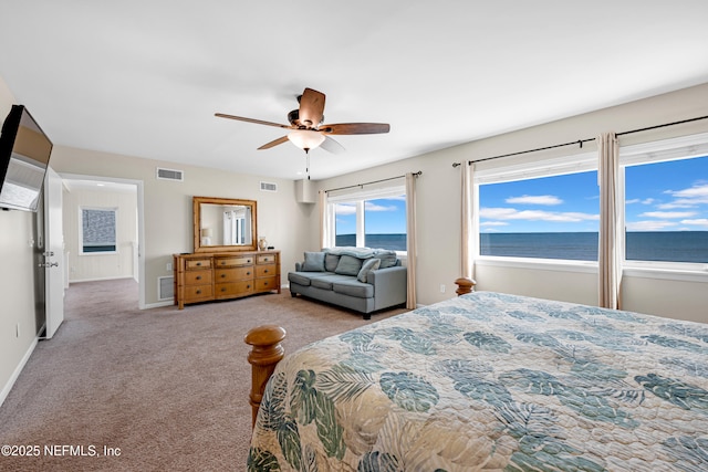 2947 S Ponte Vedra Blvd, Ponte Vedra Beach, FL 32082 - bedroom featuring carpet floors, a water view, and a ceiling fan
