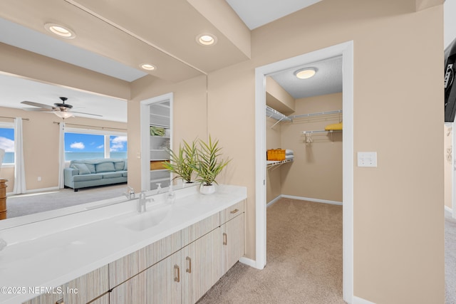 2947 S Ponte Vedra Blvd, Ponte Vedra Beach, FL 32082 - bathroom with vanity, a spacious closet, a ceiling fan, and recessed lighting