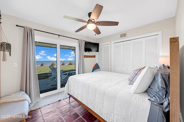 2947 S Ponte Vedra Blvd, Ponte Vedra Beach, FL 32082 - tiled bedroom with access to outside, a ceiling fan, and multiple closets