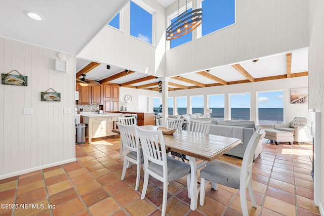 2947 S Ponte Vedra Blvd, Ponte Vedra Beach, FL 32082 - dining room featuring a water view, plenty of natural light, wooden walls, and light tile patterned floors