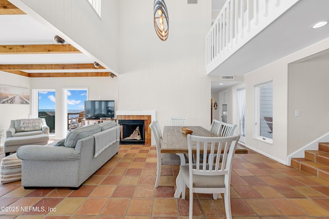 2947 S Ponte Vedra Blvd, Ponte Vedra Beach, FL 32082 - living room with a towering ceiling, a fireplace, and stairs
