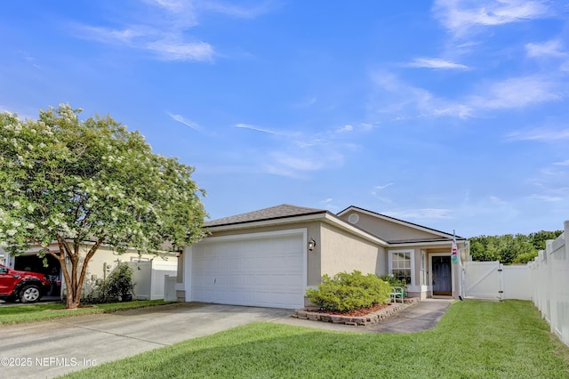 1908 Longneedle Ln, Middleburg, FL 32068 - single story home featuring a gate, a garage, stucco siding, and concrete driveway