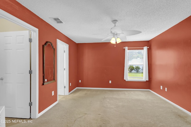1908 Longneedle Ln, Middleburg, FL 32068 - unfurnished room with carpet, ceiling fan, a textured ceiling, and baseboards