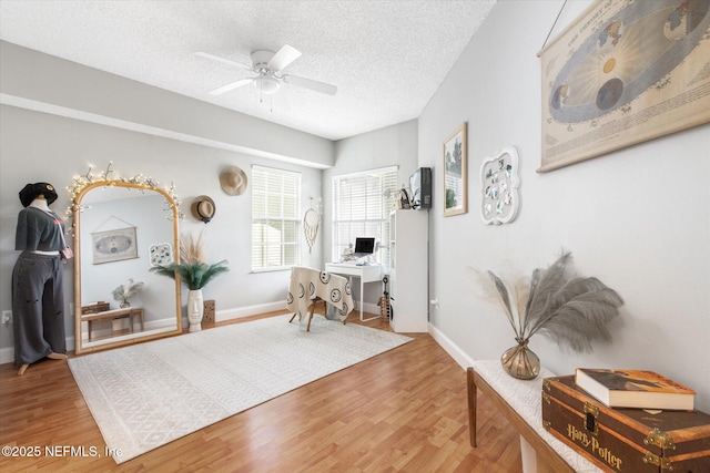 4000 Grande Vista Blvd Unit 15-206, Saint Augustine, FL 32084 - home office with wood finished floors, a ceiling fan, and a textured ceiling