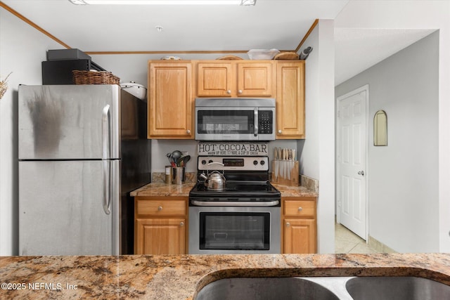 4000 Grande Vista Blvd Unit 15-206, Saint Augustine, FL 32084 - kitchen featuring appliances with stainless steel finishes and light stone countertops