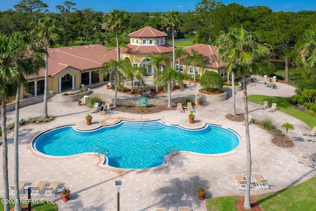 4000 Grande Vista Blvd Unit 15-206, Saint Augustine, FL 32084 - community pool featuring a patio area