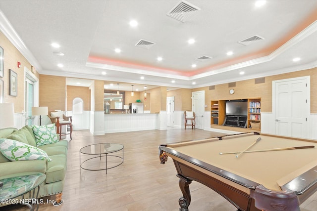 4000 Grande Vista Blvd Unit 15-206, Saint Augustine, FL 32084 - rec room with a tray ceiling, crown molding, recessed lighting, light wood-style flooring, and wainscoting