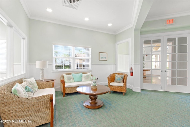 4000 Grande Vista Blvd Unit 15-206, Saint Augustine, FL 32084 - living room featuring carpet flooring, crown molding, french doors, a wainscoted wall, and recessed lighting