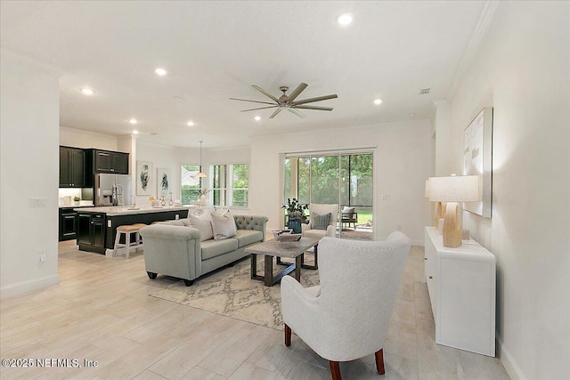17 Derecho Ln, Saint Augustine, FL 32095 - living area with ornamental molding, recessed lighting, a ceiling fan, and light wood-style flooring