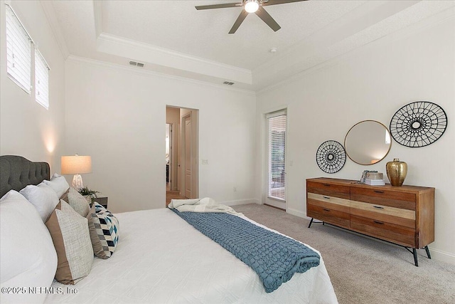 17 Derecho Ln, Saint Augustine, FL 32095 - carpeted bedroom featuring a raised ceiling, ornamental molding, and ceiling fan