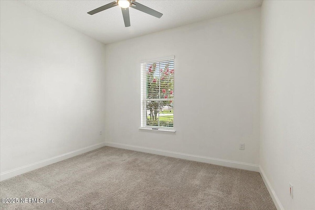 17 Derecho Ln, Saint Augustine, FL 32095 - spare room with a ceiling fan and light colored carpet