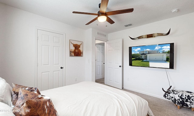 8657 Lake George Cir E, Macclenny, FL 32063 - carpeted bedroom with ceiling fan and baseboards
