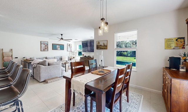 8657 Lake George Cir E, Macclenny, FL 32063 - dining space with a ceiling fan and light tile patterned floors