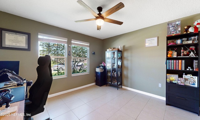 8657 Lake George Cir E, Macclenny, FL 32063 - home office featuring ceiling fan, tile patterned floors, and a textured ceiling