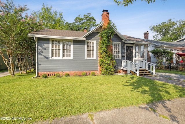 1094 Wolfe St, Jacksonville, FL 32205 - view of front facade with a chimney