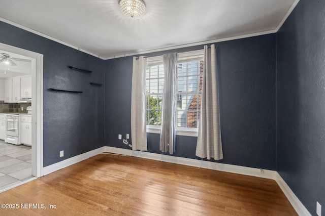 1094 Wolfe St, Jacksonville, FL 32205 - unfurnished room featuring crown molding and light wood finished floors