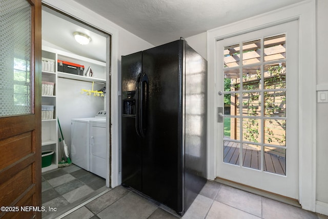 1094 Wolfe St, Jacksonville, FL 32205 - washroom featuring independent washer and dryer and tile patterned flooring