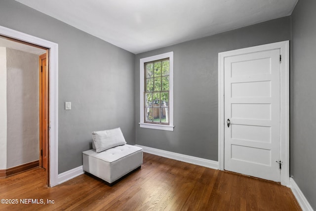 1094 Wolfe St, Jacksonville, FL 32205 - living area with dark wood-style flooring